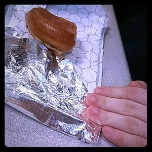 A half eaten bagel with egg😂😂 it was bitten